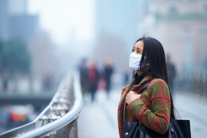 Chinese woman in mask