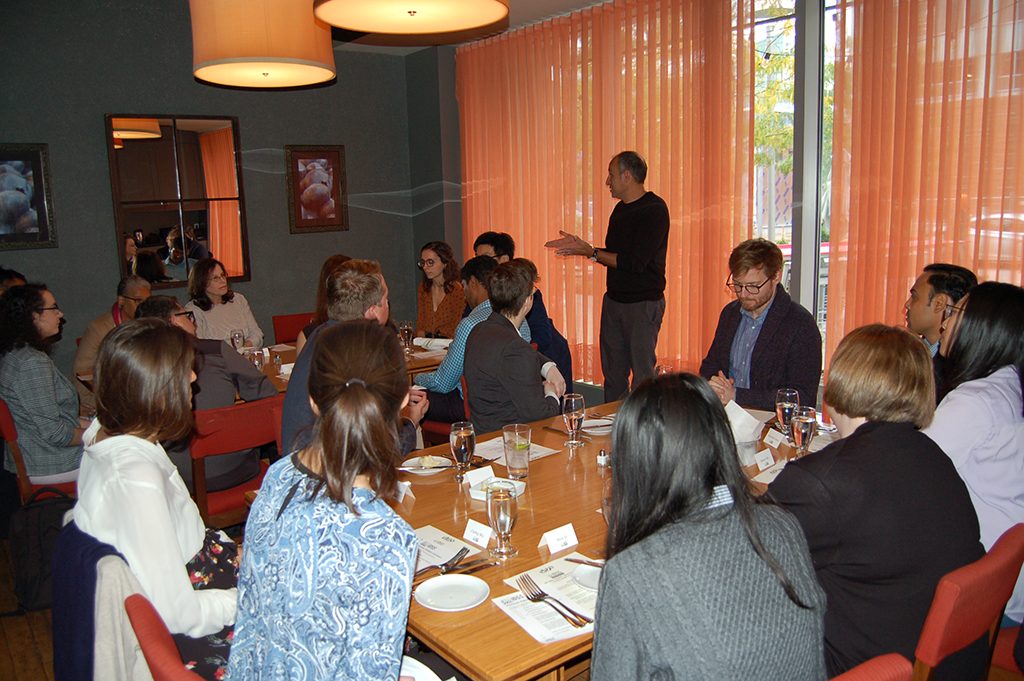 IDSS students, staff, and faculty listen to remarks from IDSS director Munther Dahleh at the 2019 Hammer Lunch.