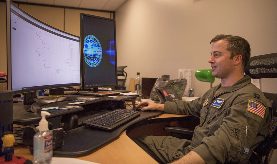 Capt. Kevin Thurber of the 315th Airlift Wing at Joint Base Charleston, South Carolina, uses the Puckboard software program to schedule C-17 aircrews.