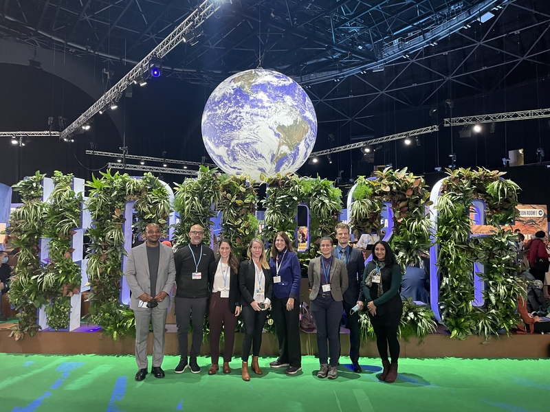 Members of MIT’s COP26 delegation stand together for a photo