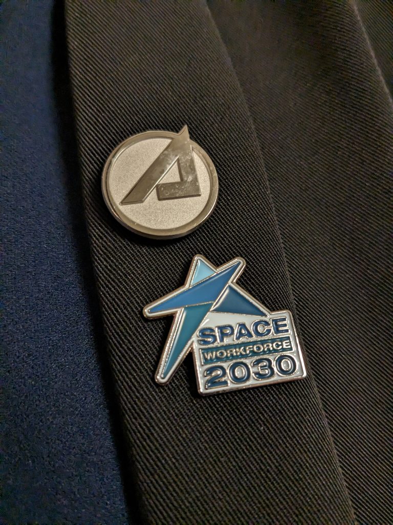 a lapel pin that says space workforce 2030