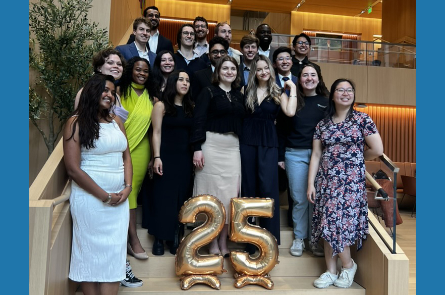 IDSS 2025 graduates from the Technology and Policy Program on the steps inside the College of Computing building